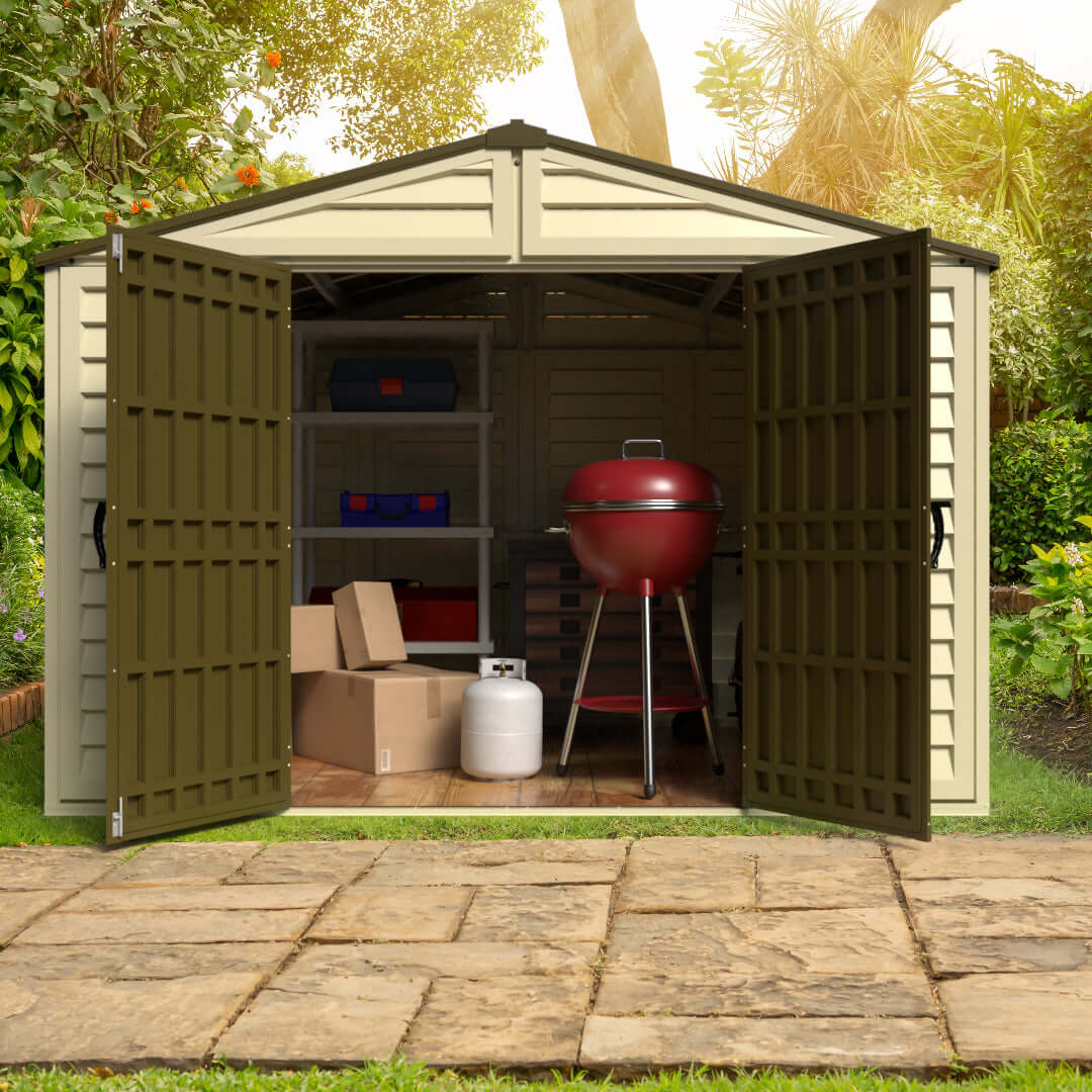Duramax 10.5x8 Woodbridge PLUS Vinyl Shed with doors open, showcasing interior space and storage potential.