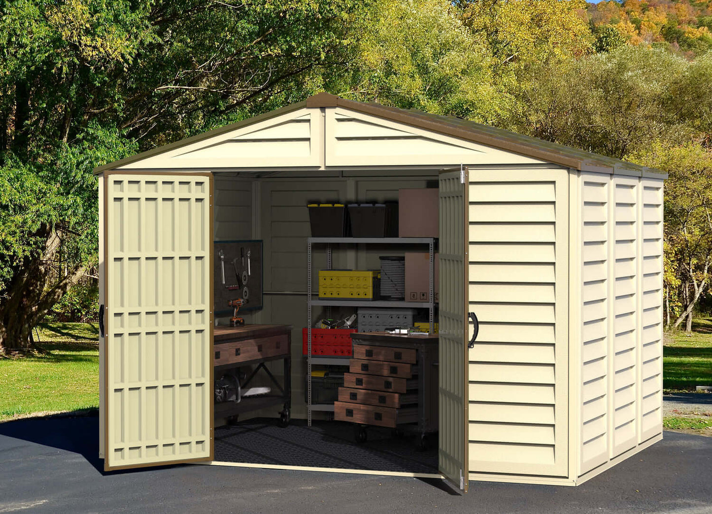 Duramax 10.5x8 Woodbridge PLUS Vinyl Shed with open doors showing storage, durable and weather-resistant, includes foundation frame.