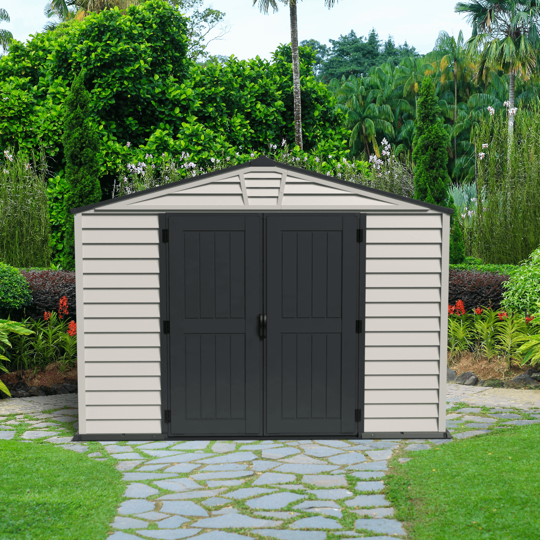 Duramax 10x8 StoreMax PLUS Vinyl Shed with floor in a garden setting, showcasing durable, all-weather construction.