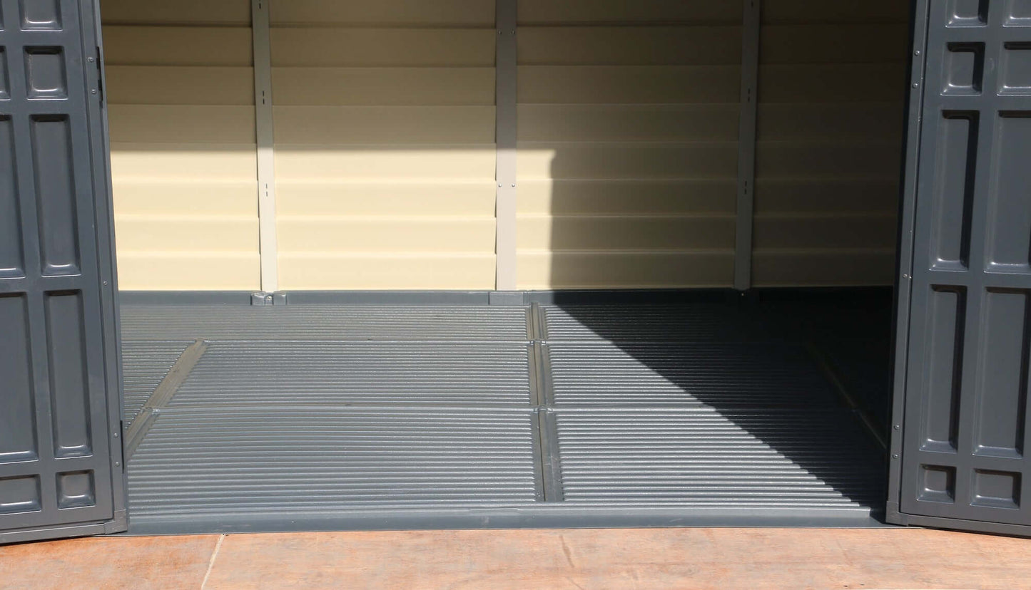 Interior view of Duramax 10x8 StoreMax PLUS Vinyl Shed with durable all-weather vinyl floor and open double doors.