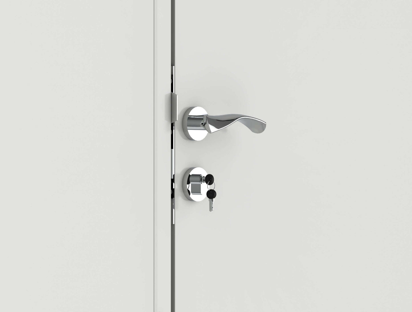 Close-up of a modern silver door handle with a key inserted in the lock.
