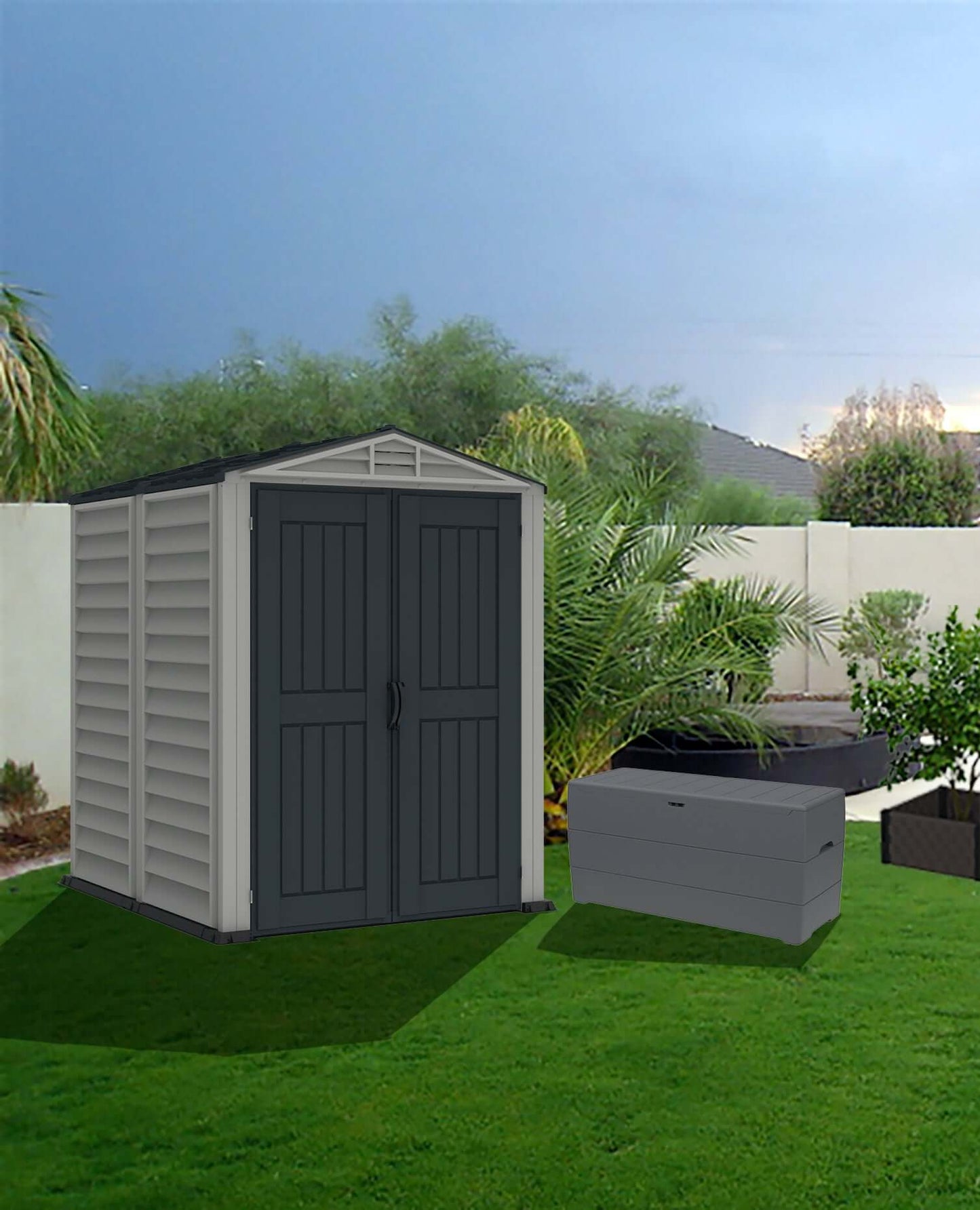 Duramax YardMate PLUS 5x5 vinyl shed in backyard, featuring robust construction with weather-resistant vinyl and steel frame.
