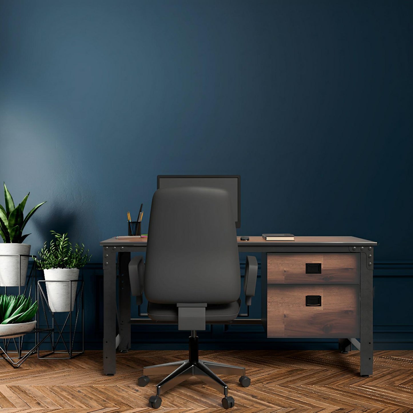 Duramax Jackson Industrial Metal & Wood Desk with drawers in home office setting, featuring a chair and potted plants.