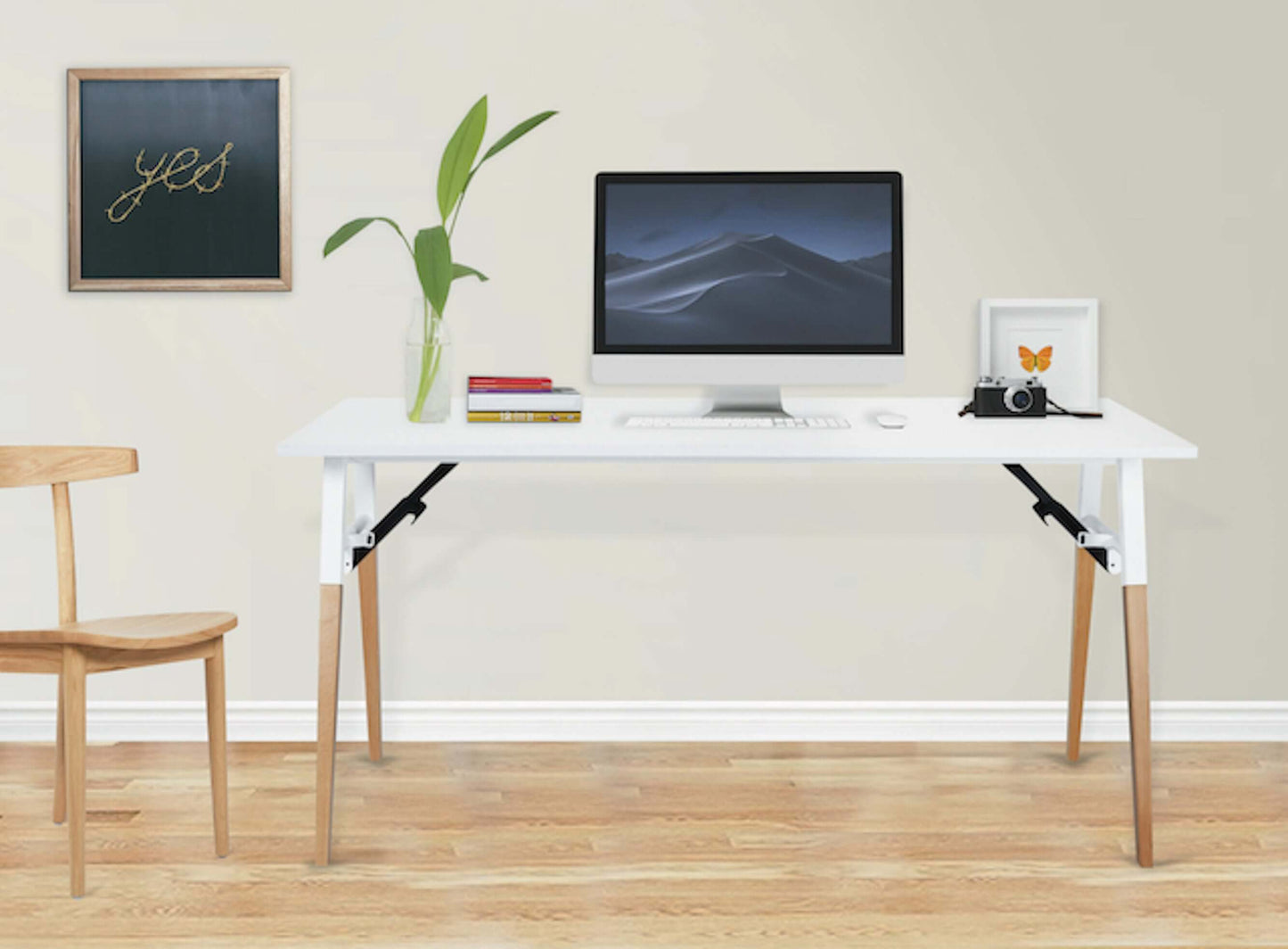 Duramax Neo Folding Table 68053 with white MDF top and beechwood legs, set up as a stylish desk in a modern home office.