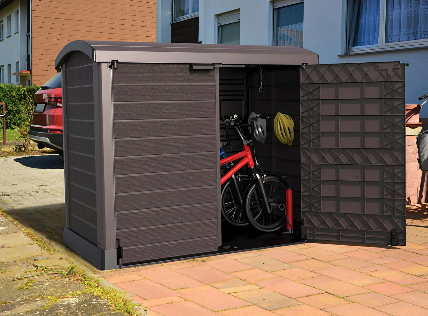 Duramax Storeaway Arc Lid 1200L Brown garden shed with open doors, storing a bicycle and garden tools, displayed outdoors.