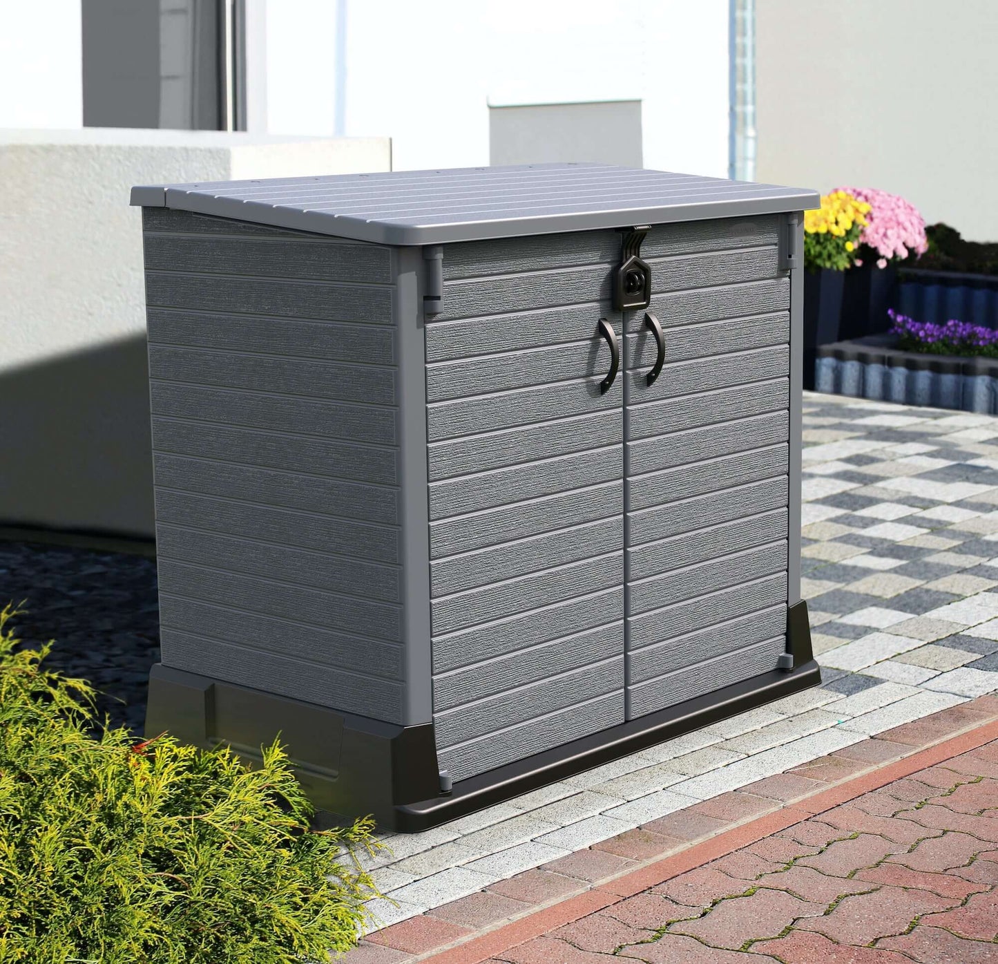 Duramax Storeaway Flat Lid 1200L Gray 86630 outdoor garden shed with wide doors, ideal for storing tools, bikes, and more.