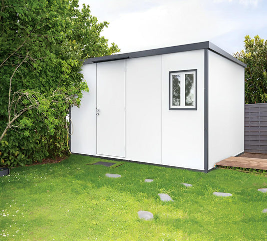 Duramax 13x10 flat roof insulated shed in a garden, ideal for storage.