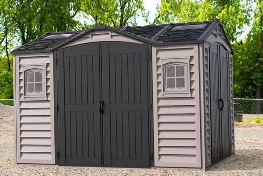 Duramax 10.5x8 Apex Pro Vinyl Shed with Foundation 40116 featuring double doors for versatile storage solutions.