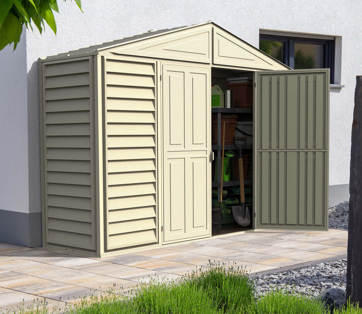 Duramax 10x3 SidePro vinyl shed with open doors, showcasing storage space against a house wall, ideal for outdoor organization.