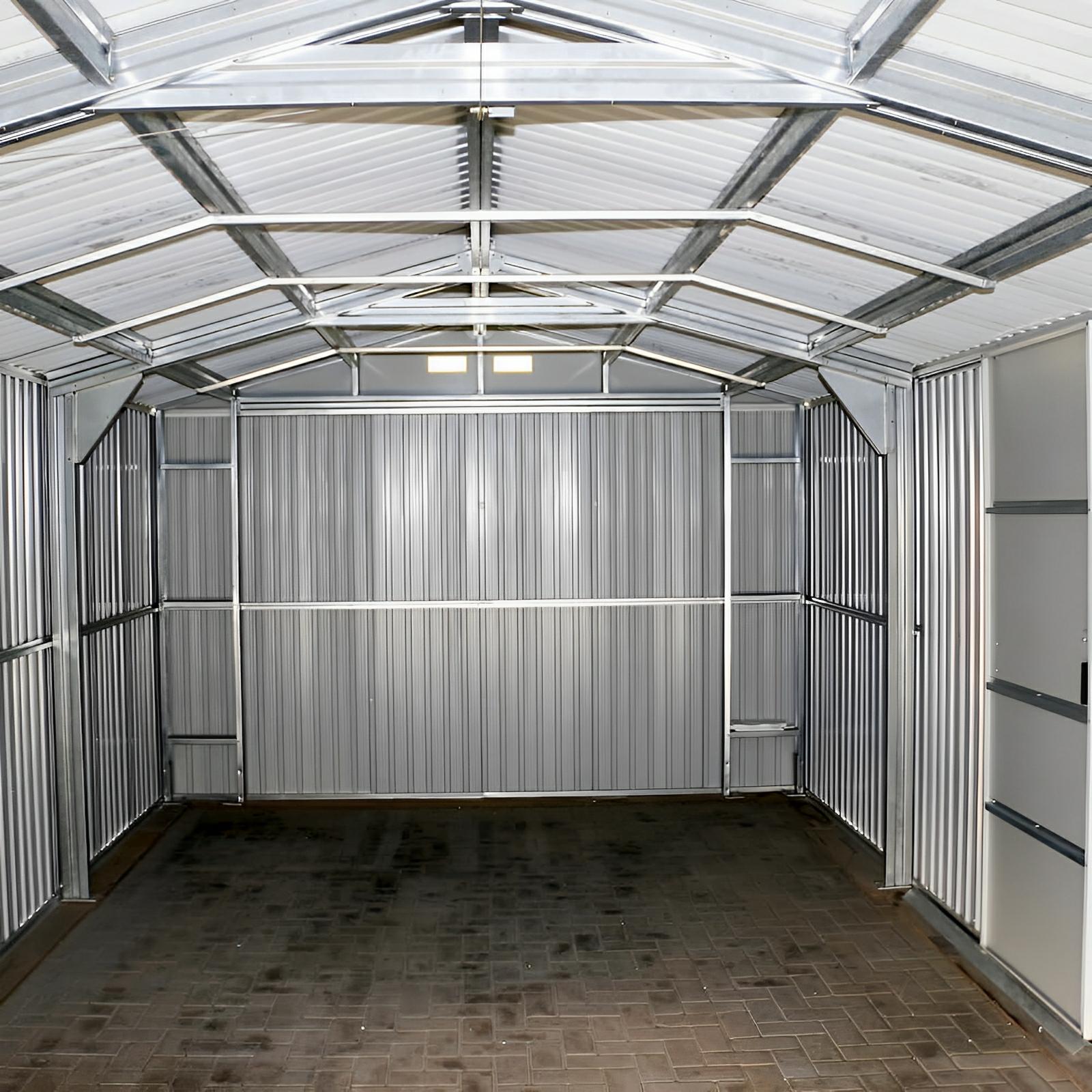 Interior view of Duramax 12x20 Imperial Metal Garage in dark gray, showcasing steel structure and spacious design.