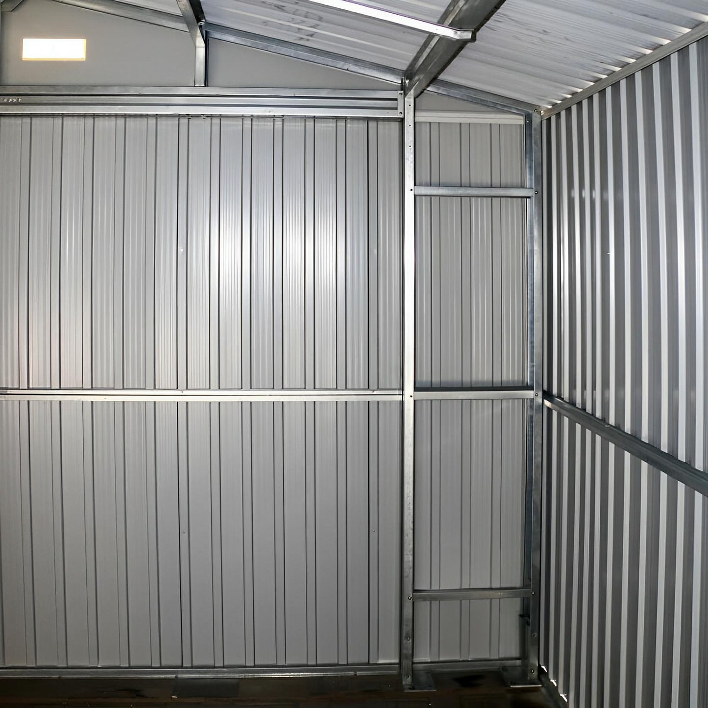 Interior view of Duramax 12x20 Imperial Metal Garage showcasing steel walls and sturdy construction for durability and security.