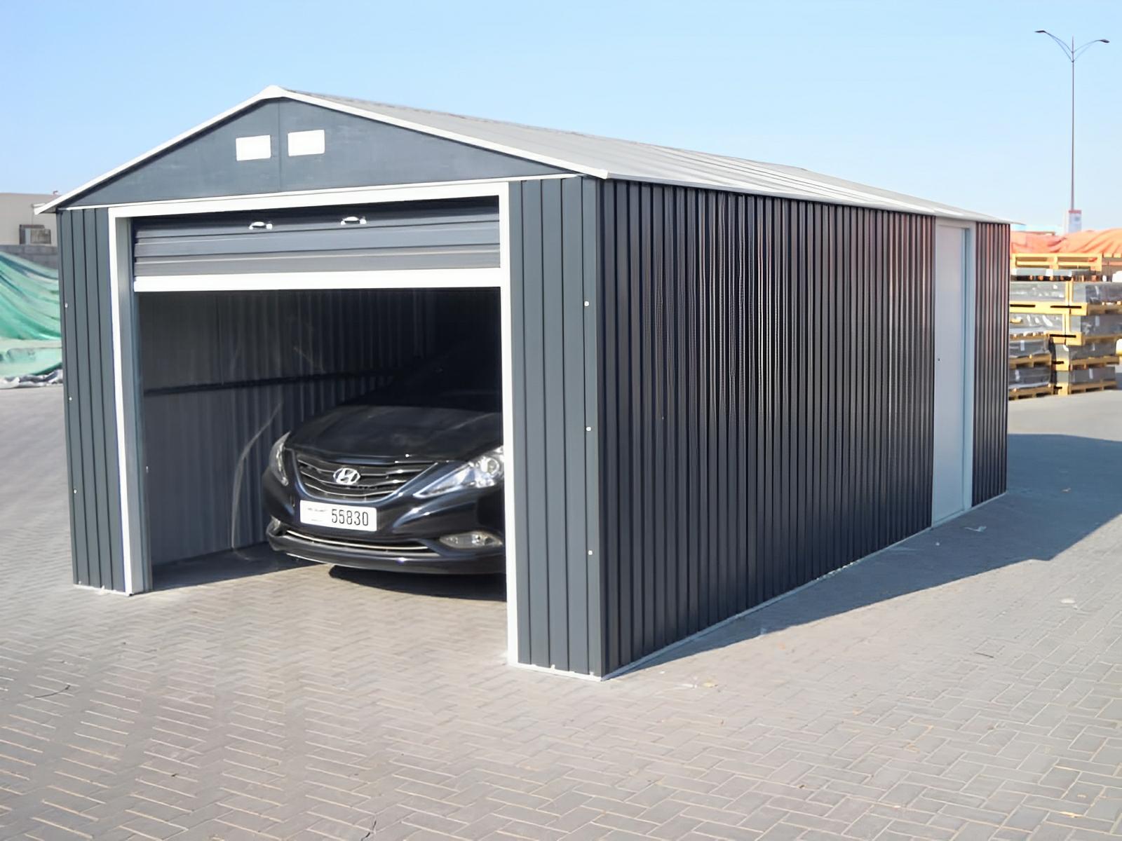 Duramax 12x20 Imperial Metal Garage in light gray with a car parked inside, showcasing durability and ample storage space.