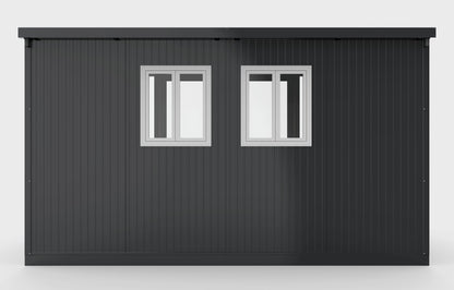 Duramax 13x10 Glass Garden Room featuring sturdy steel walls with windows, ideal for versatile backyard use and entertainment.