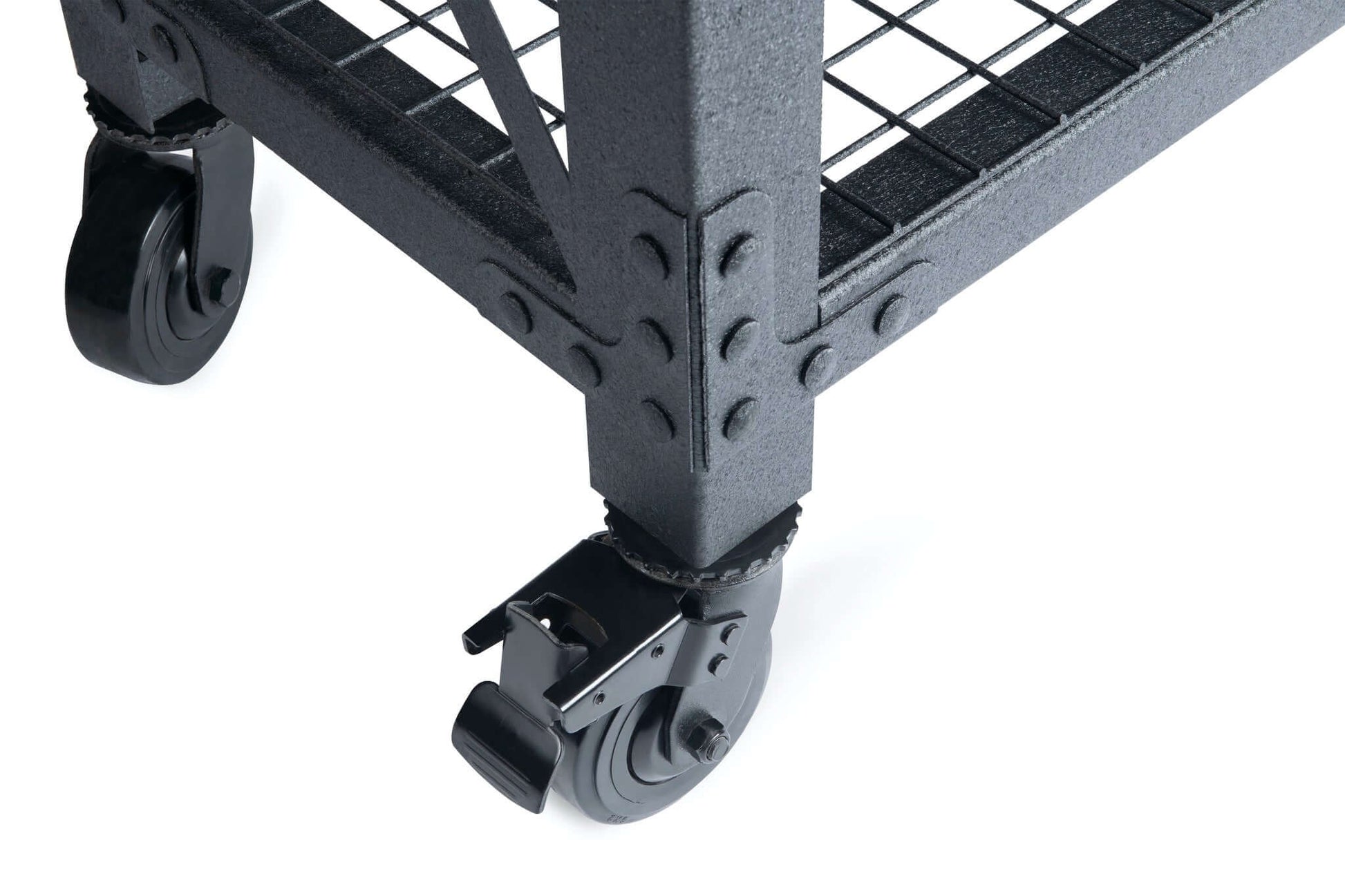 Close-up of a rolling caster on the Duramax Industrial Workbench, showing sturdy metal construction and grid lower shelf.