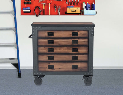 Duramax 36-Inch 5-Drawer Rolling Tool Chest with Wood Top in a workshop setting, featuring industrial metal frame and natural wood finish.
