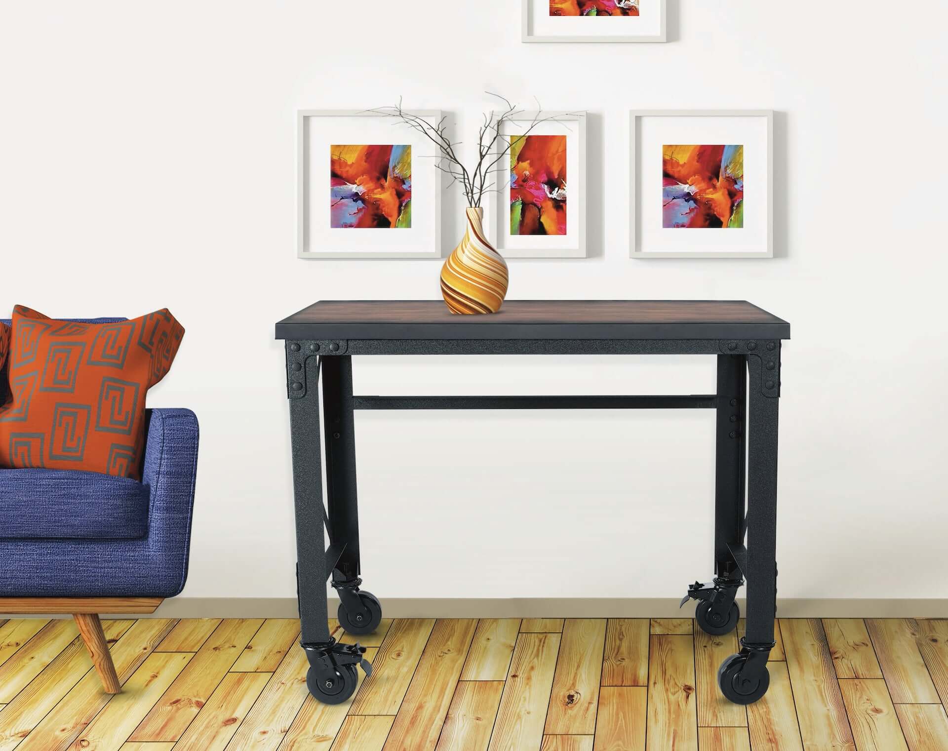 Duramax 46x24 Rolling Industrial Worktable with wooden top and metal frame, featuring caster wheels, in a modern room setting