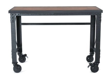Duramax 52x24 inch industrial worktable with caster wheels, dark wood top, and metal frame for versatile workspace use.