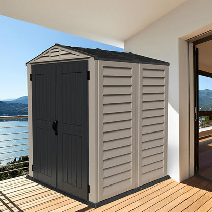 Duramax 5x5 YardMate PLUS Vinyl Shed with floor on patio, all-weather vinyl resin construction, easy assembly