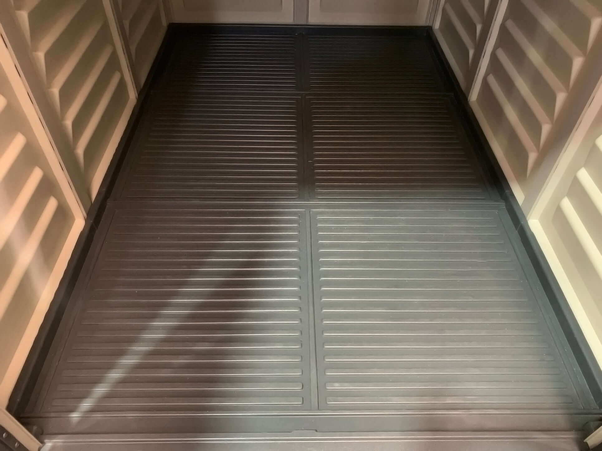 Interior floor view of Duramax Shed 6x6 StoreMate PLUS with durable vinyl flooring for secure storage solutions.