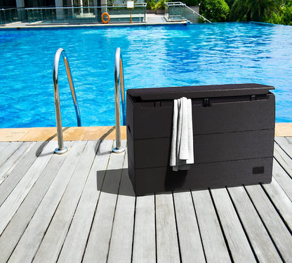 Duramax 71 Gallon Deck Box in brown on poolside deck, ideal storage solution, stylishly mimics wood, made from durable materials.