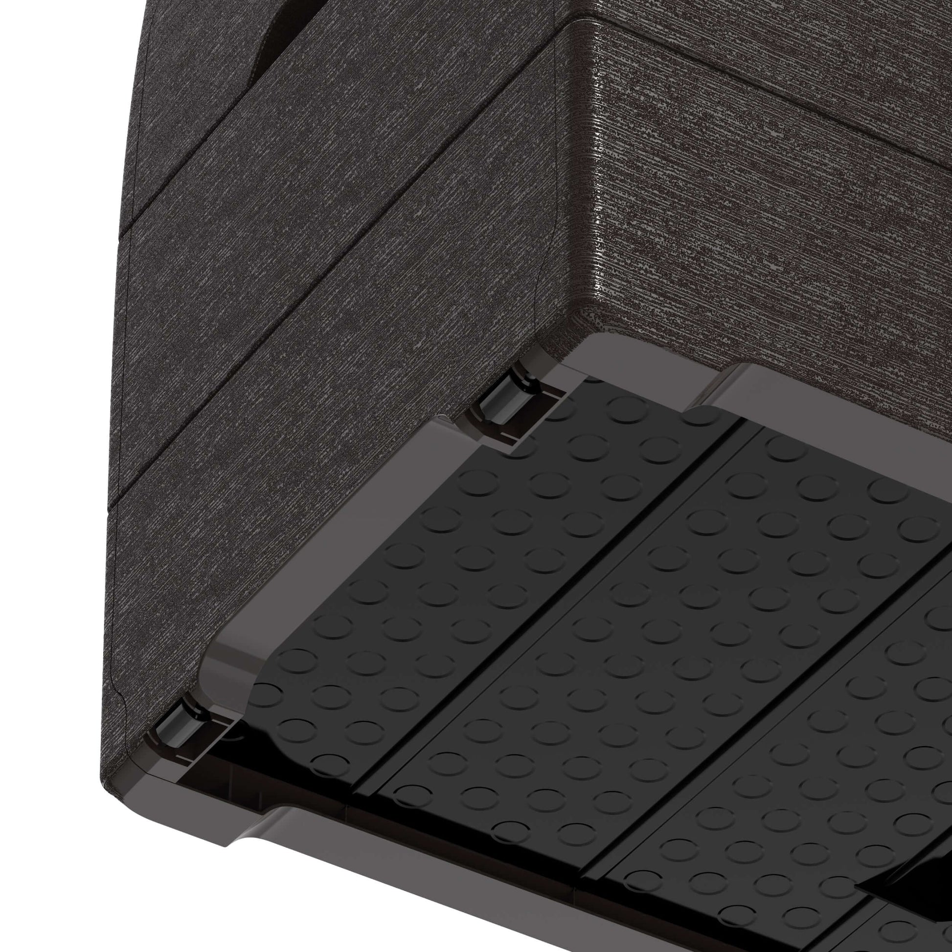 Close-up of the bottom corner of a Duramax 71 Gallon Deck Box, showing the brown resin texture, suitable for outdoor storage.