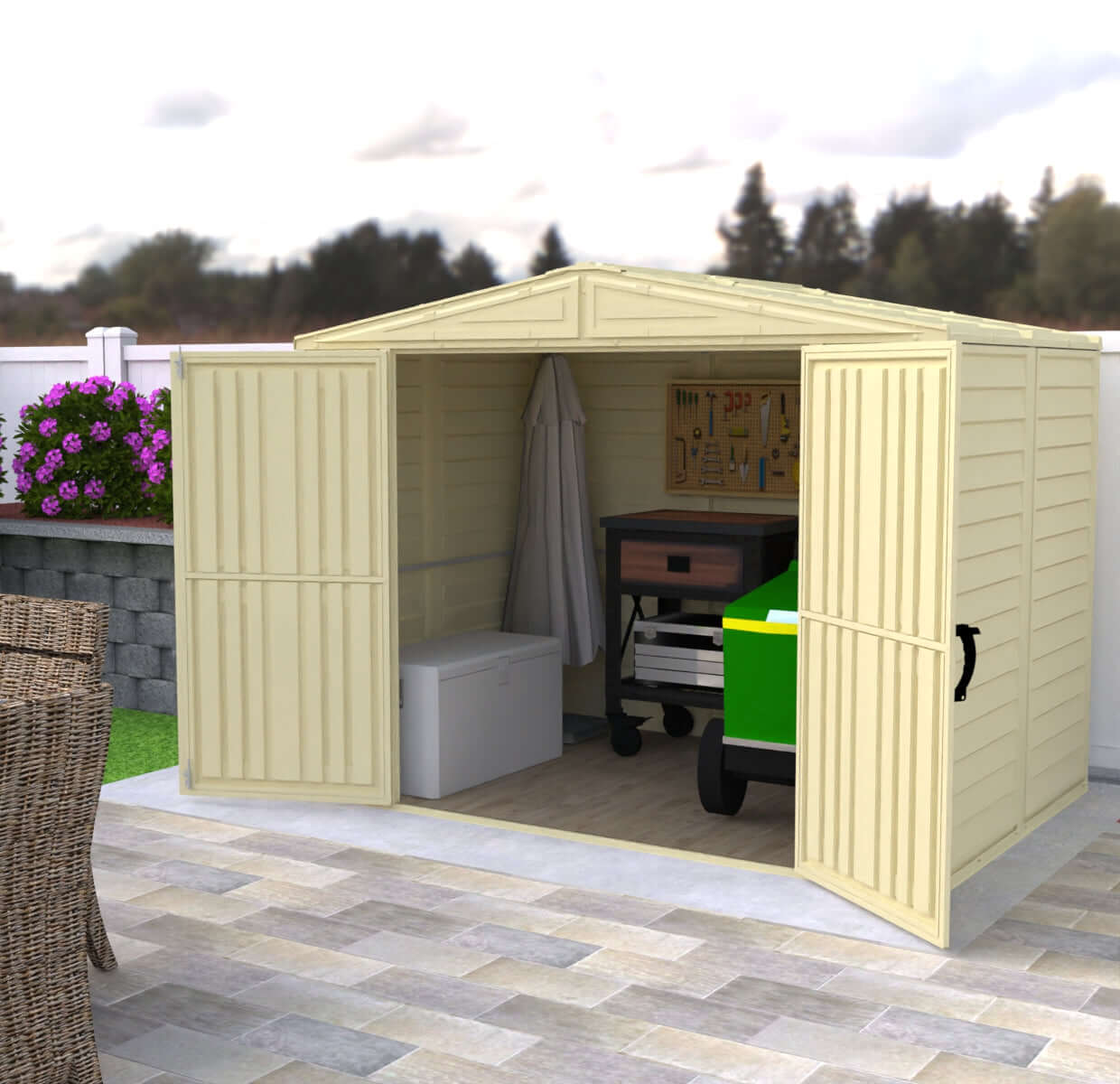 Duramax 8x6 DuraMate Vinyl Shed with open doors displaying gardening tools and equipment on a foundation platform.