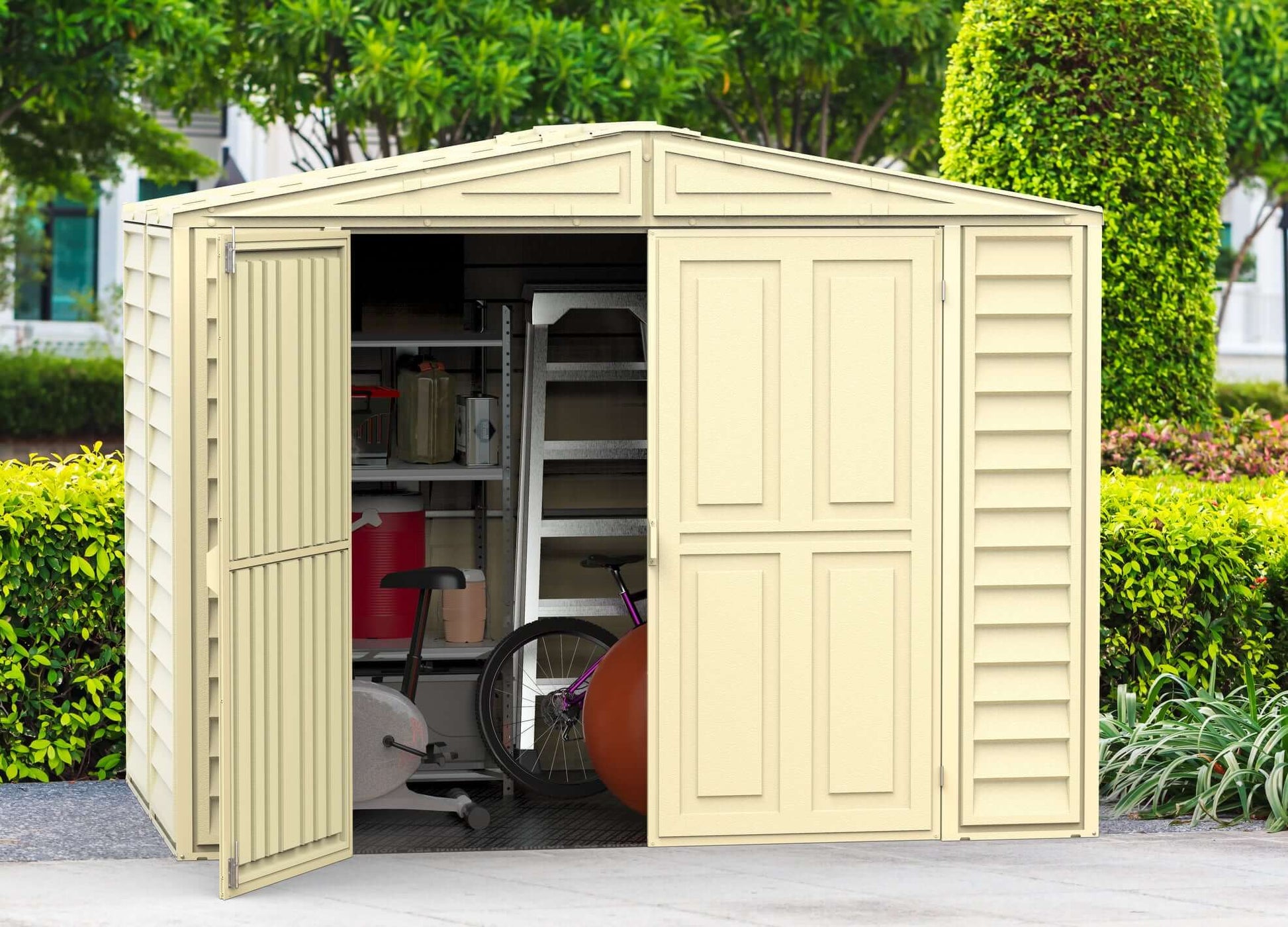 Duramax 8x6 DuraMate Vinyl Shed with open doors displaying organized interior storage.