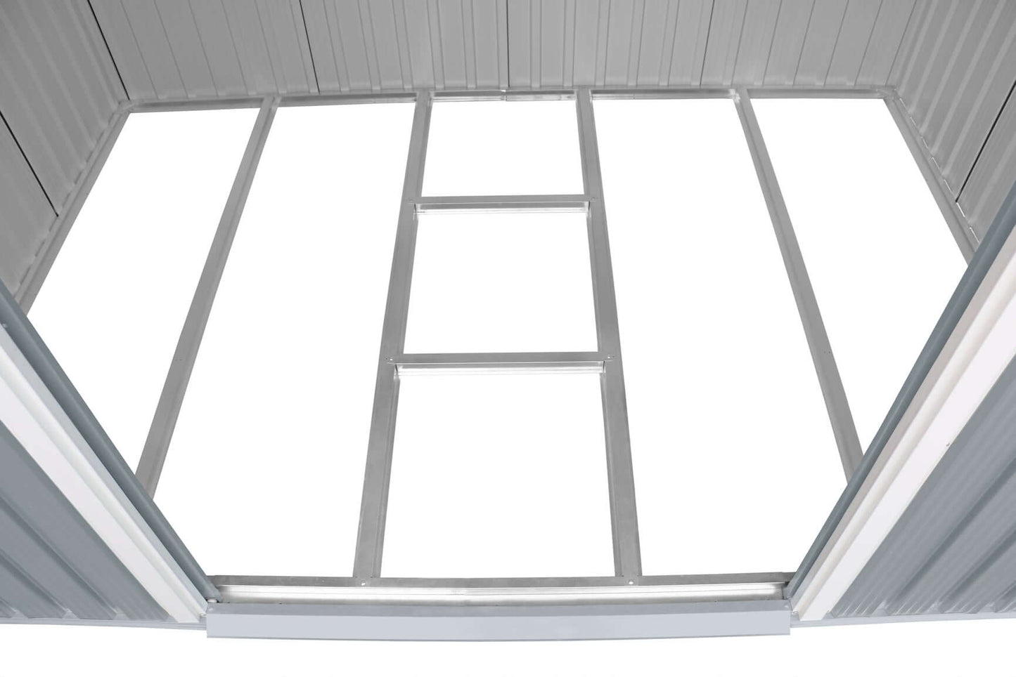 Interior view of a Duramax 8x6 metal shed frame showing ample storage space with durable construction.