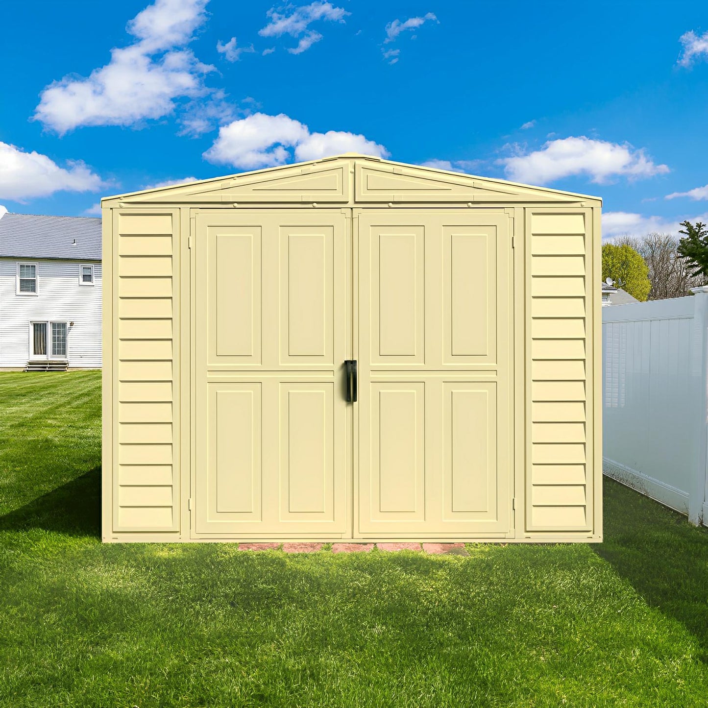 Alt Tag: Duramax 8x8 DuraMate Vinyl Shed with double doors in backyard, featuring sturdy metal-reinforced walls. Ideal garden storage.