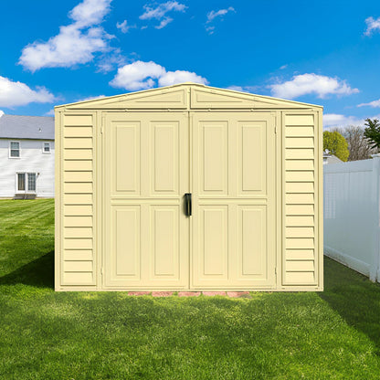 Alt Tag: Duramax 8x8 DuraMate Vinyl Shed with double doors in backyard, featuring sturdy metal-reinforced walls. Ideal garden storage.