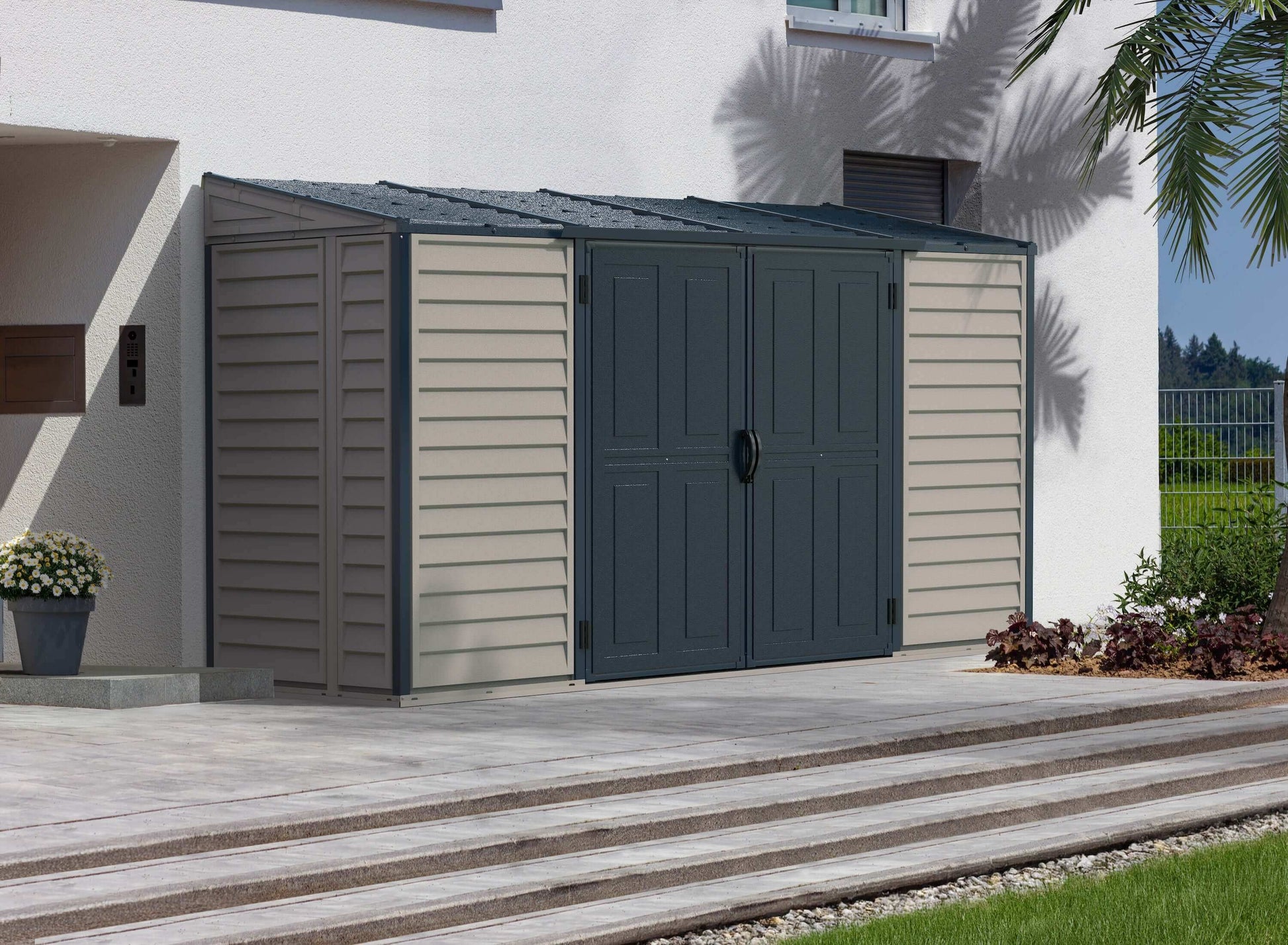 Duramax Vinyl Shed 10x4 SideMate Plus ProStorage by Duramax Building Products beside home